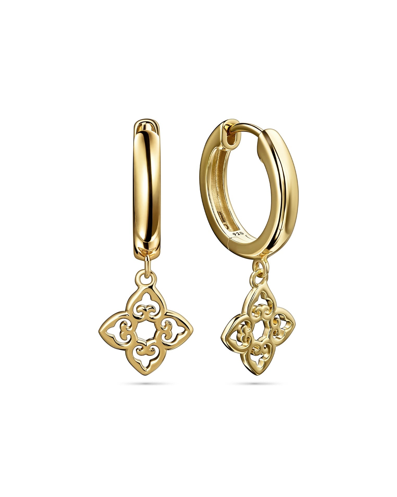 Gold hoop earrings with clover-shaped charms on a white background
