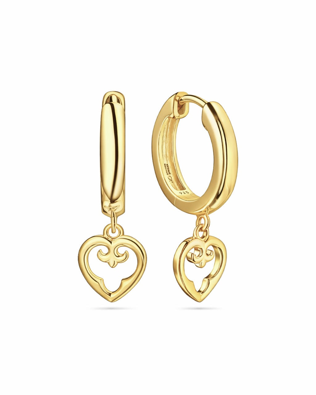 Gold hoop earrings with heart-shaped charms on a white background