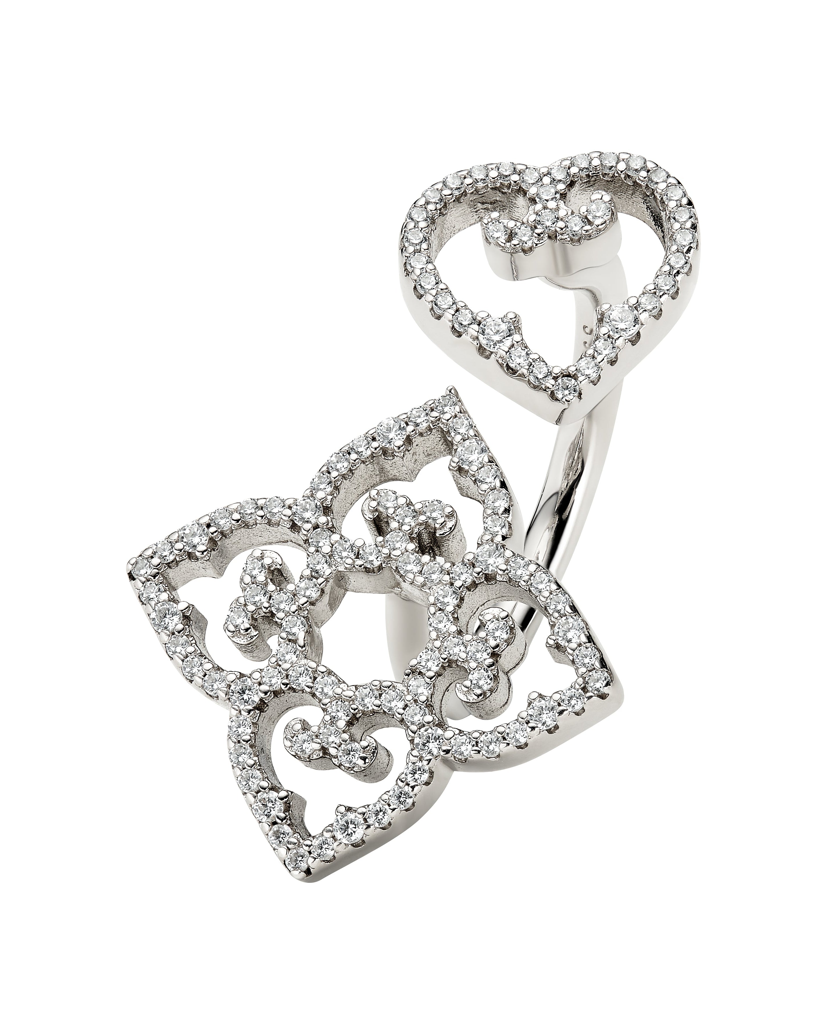Silver heart-shaped pendant with embedded stones on a white background