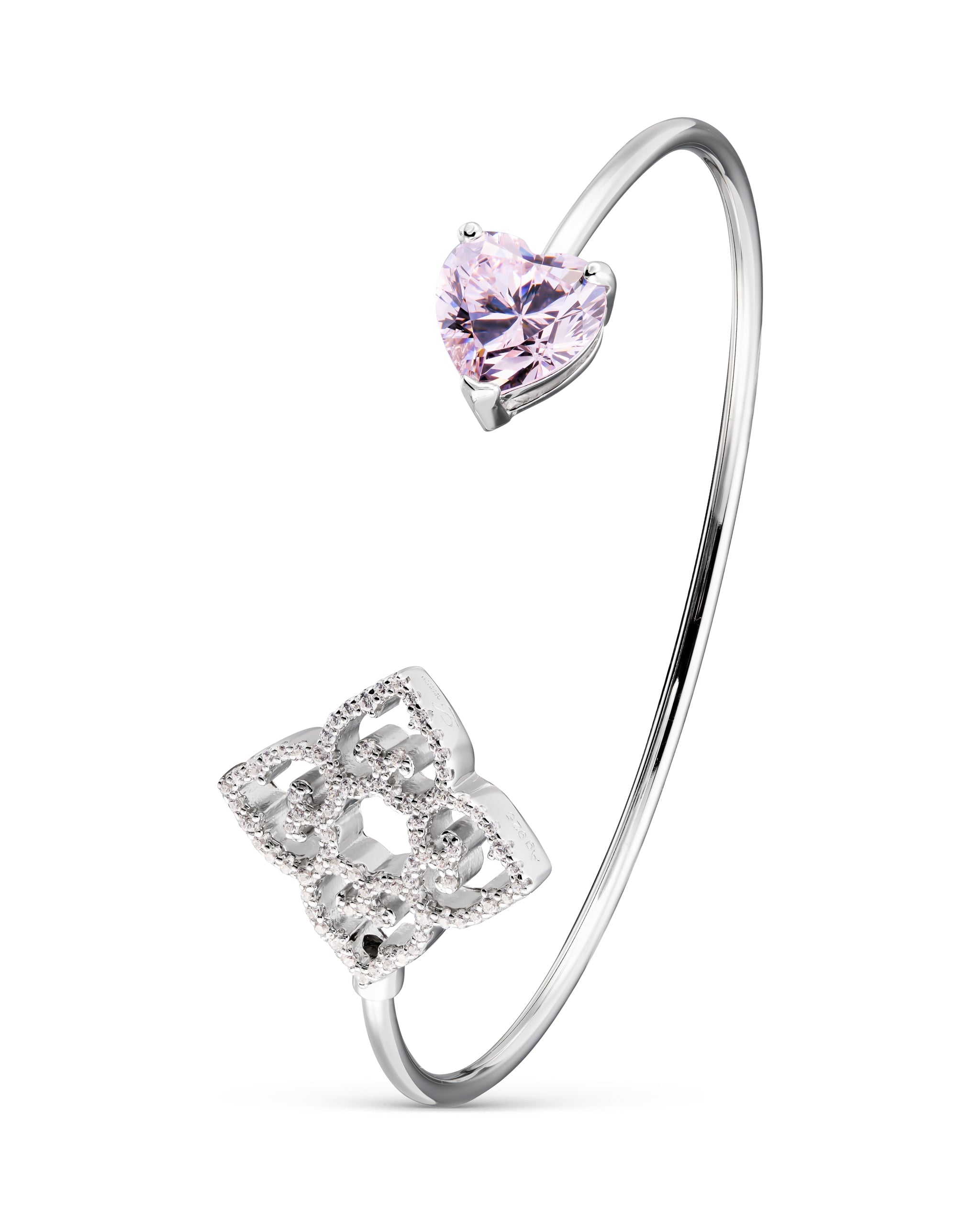 Silver open bangle with a pink heart-shaped gemstone on a white background