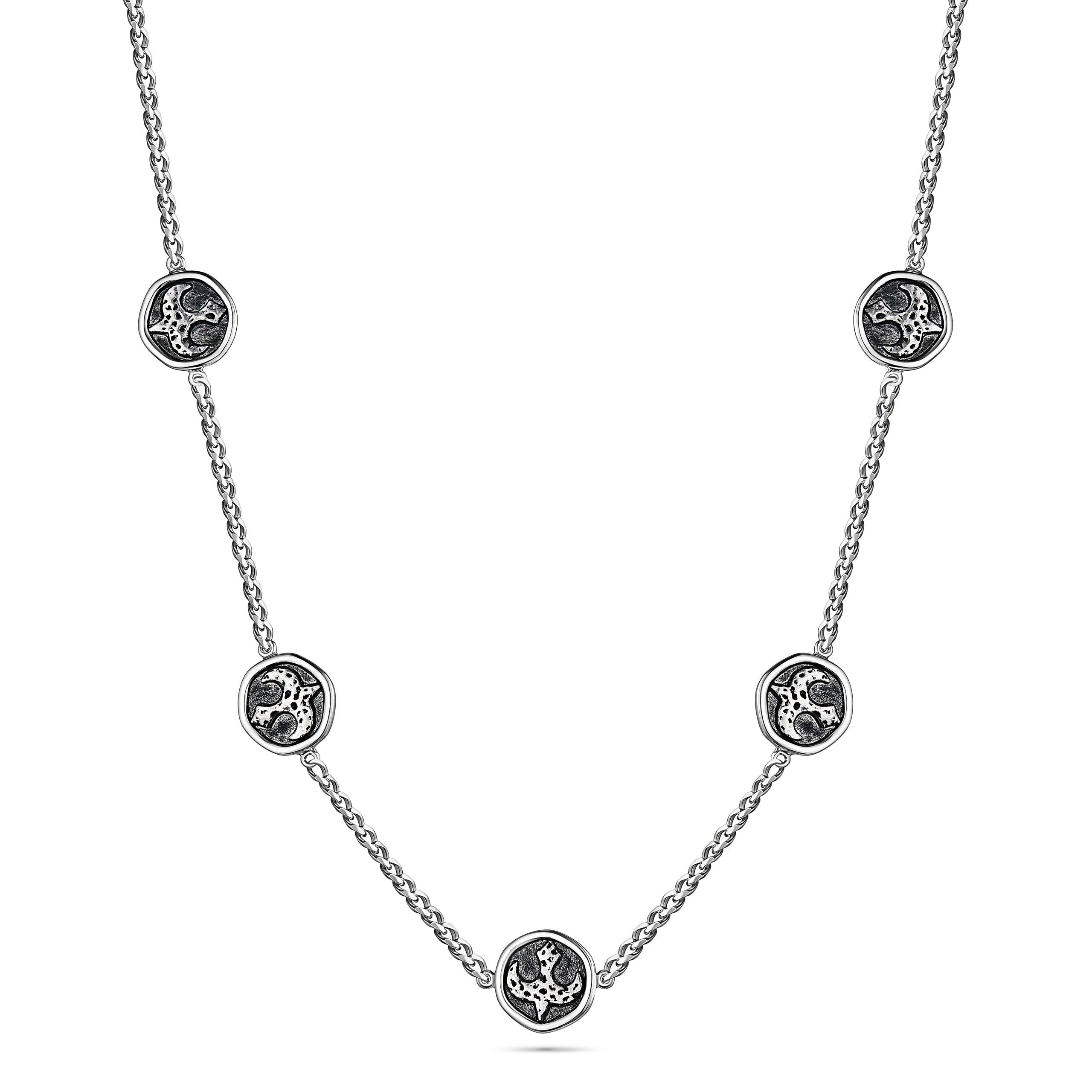 Silver necklace with circular pendants on a white background