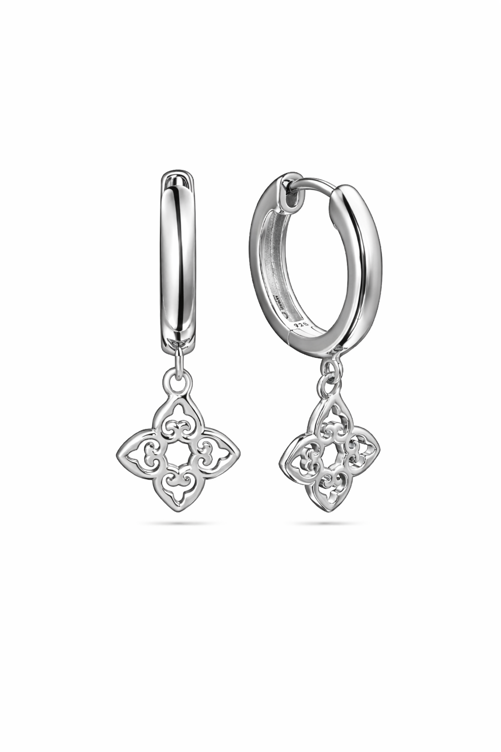 Silver hoop earrings with clover-shaped charms on a white background