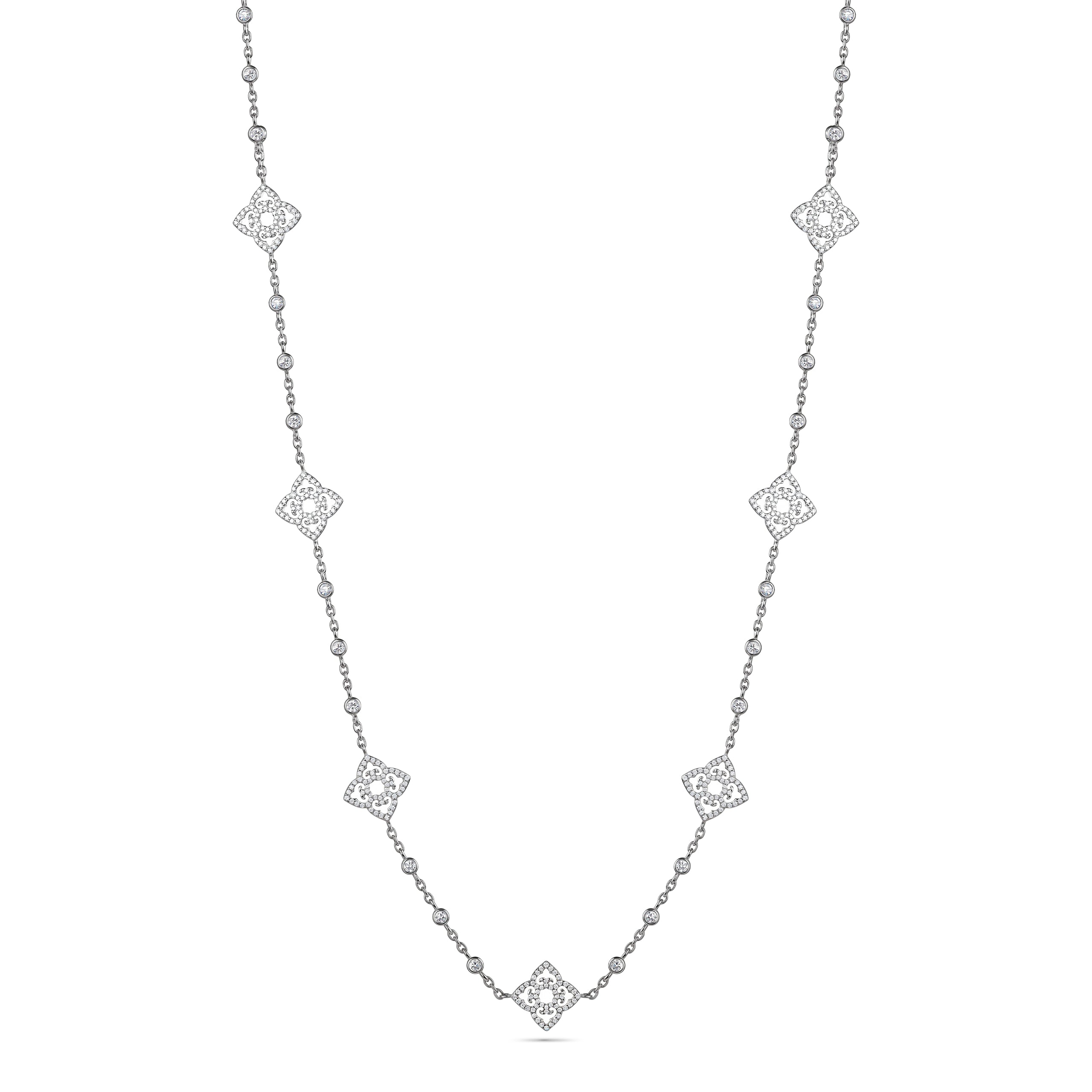 Silver necklace with diamond-like pendants on a white background