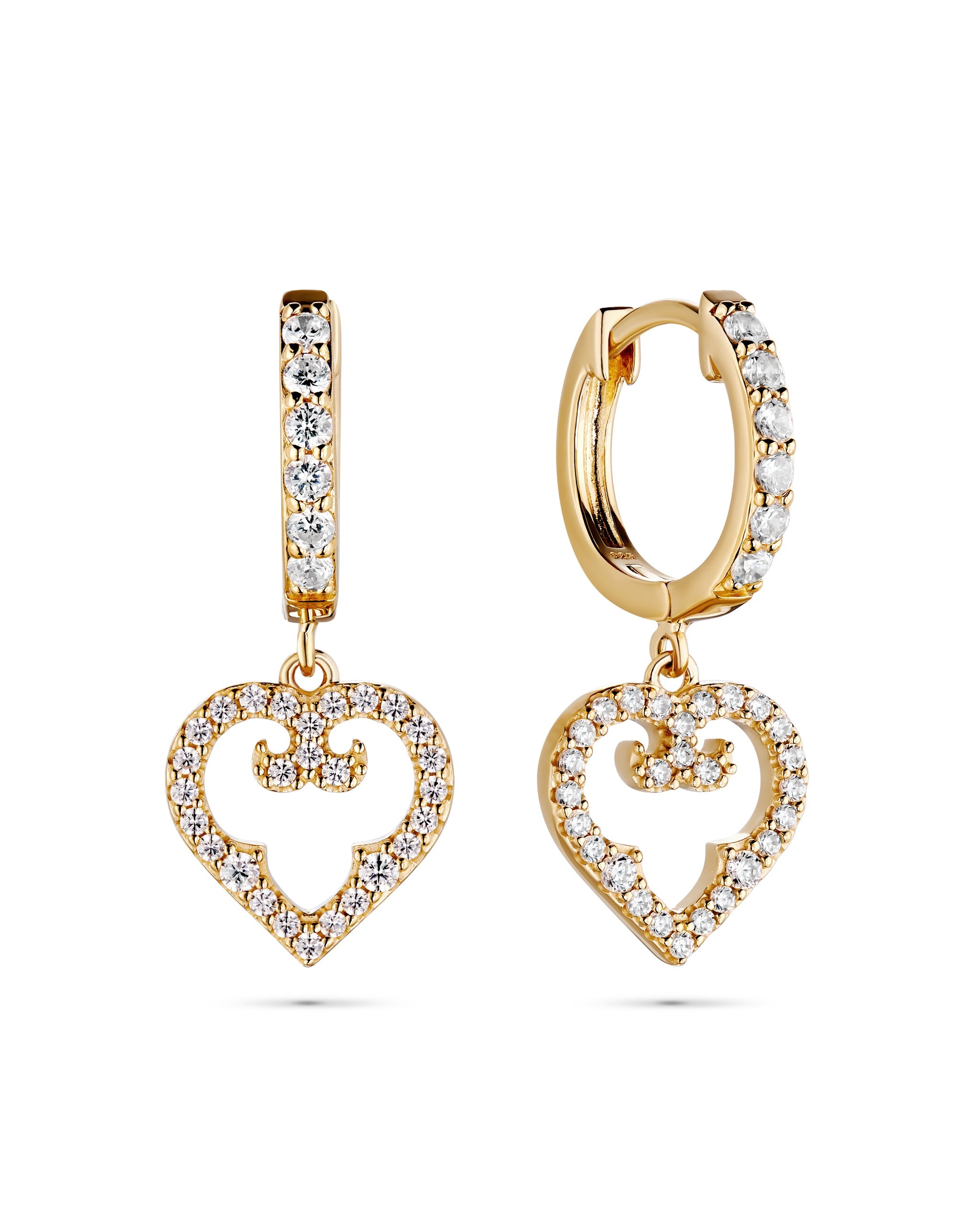 Gold heart-shaped earrings with clear stones on a white background