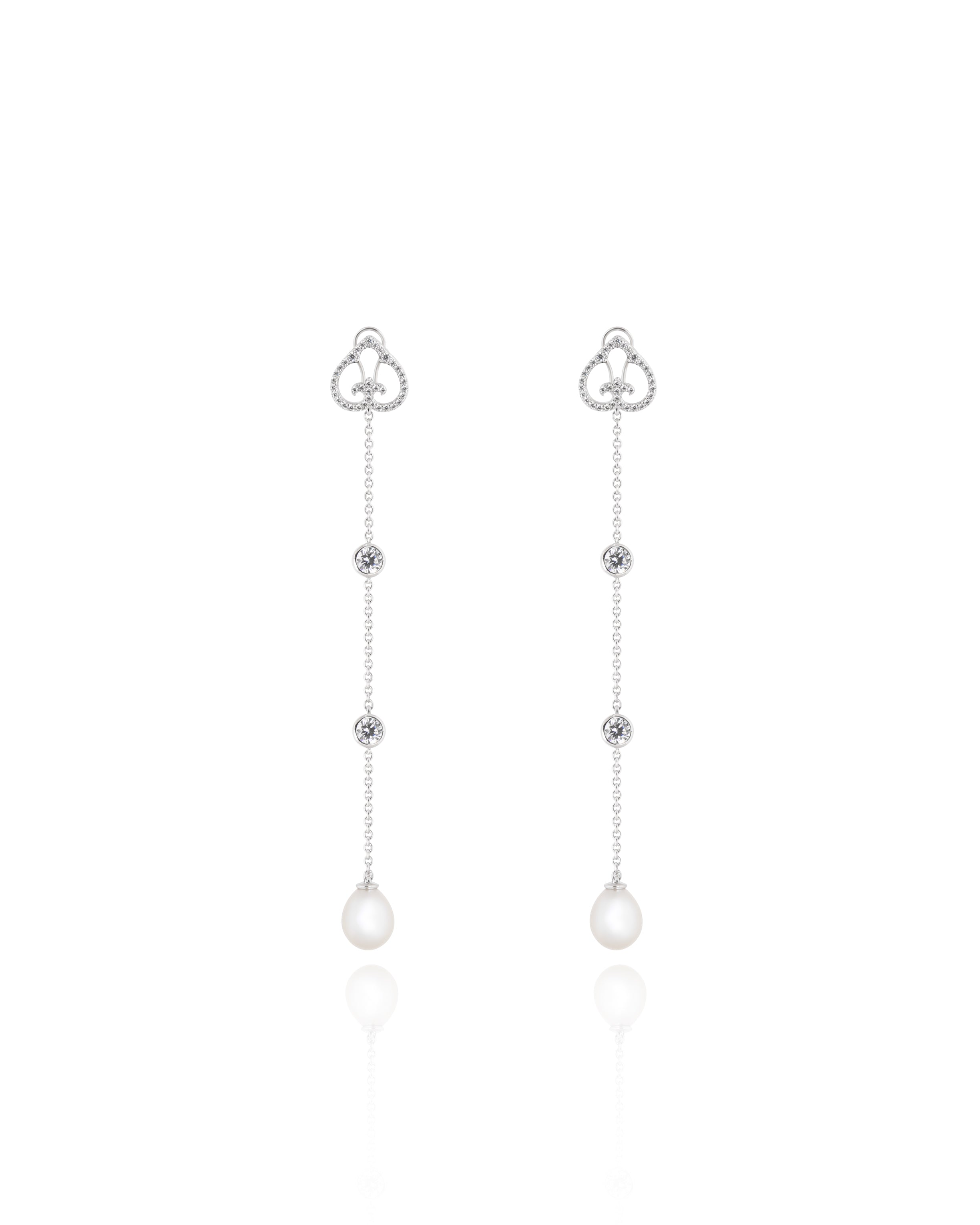 Pair of silver earrings with heart-shaped tops and pearl drops on a white background