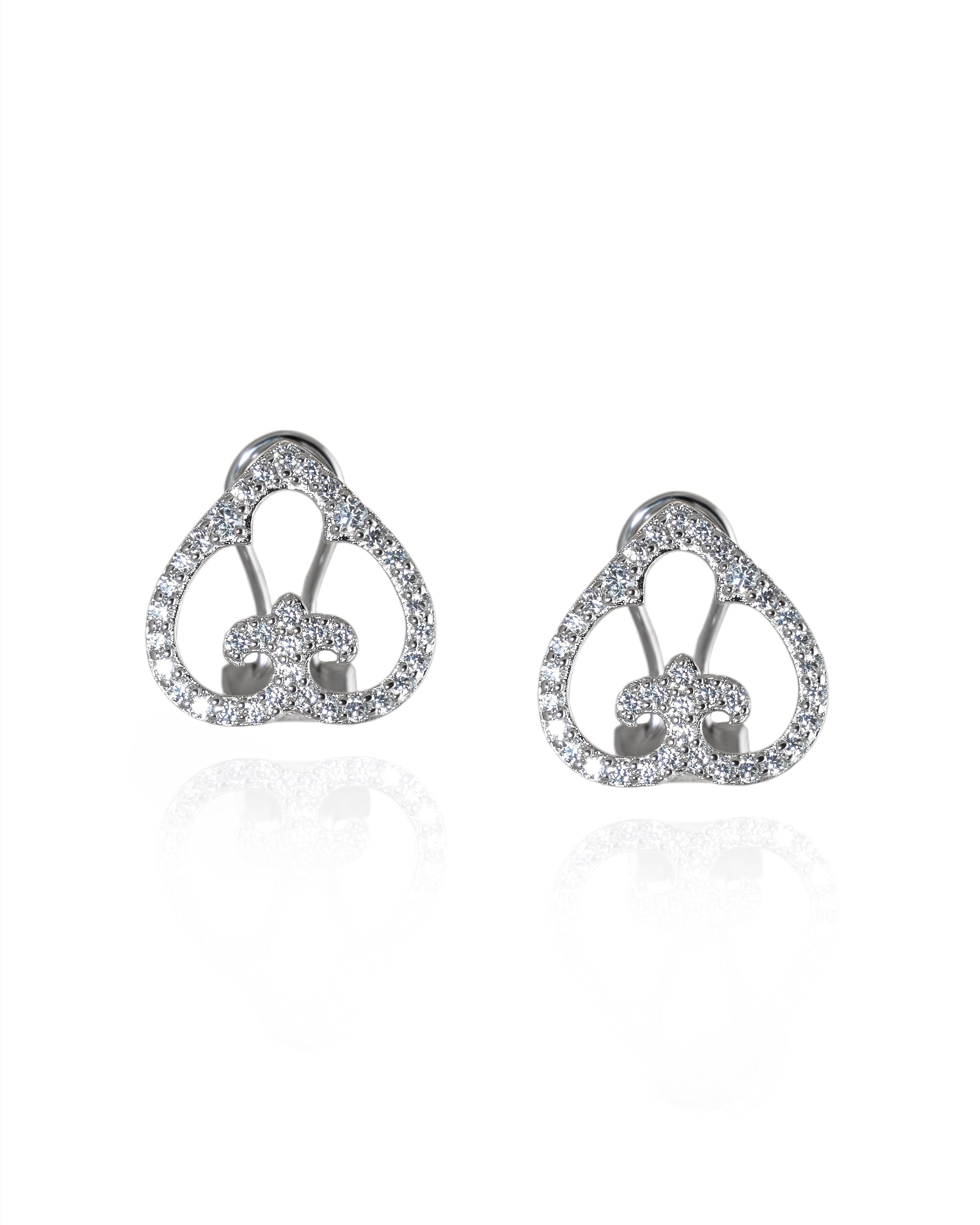 Pair of silver heart-shaped earrings on a white background