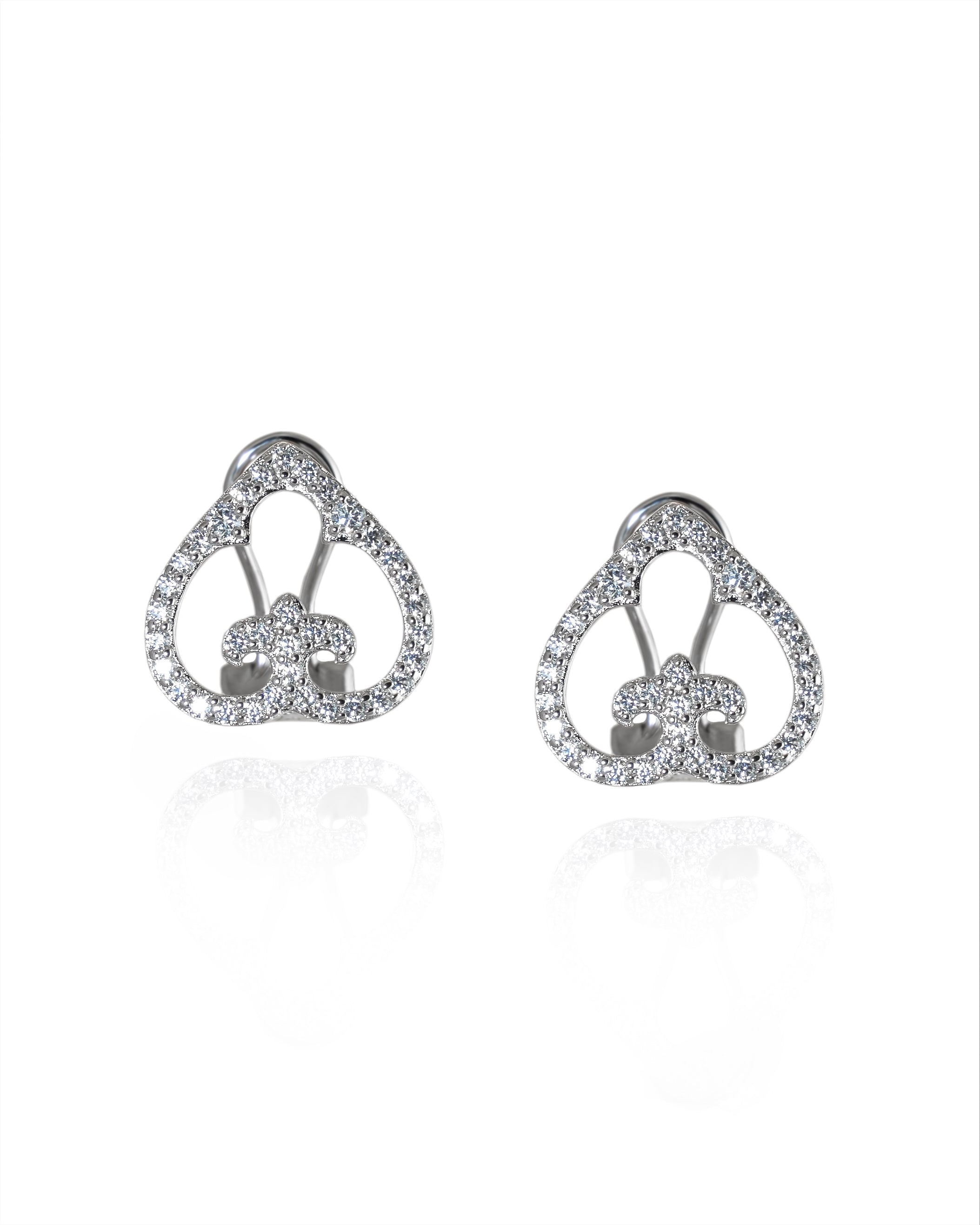 Pair of silver heart-shaped earrings on a white background