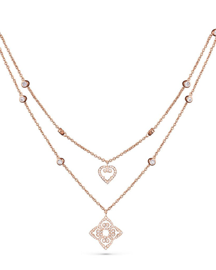 Rose gold necklace with heart and square pendants on a white background