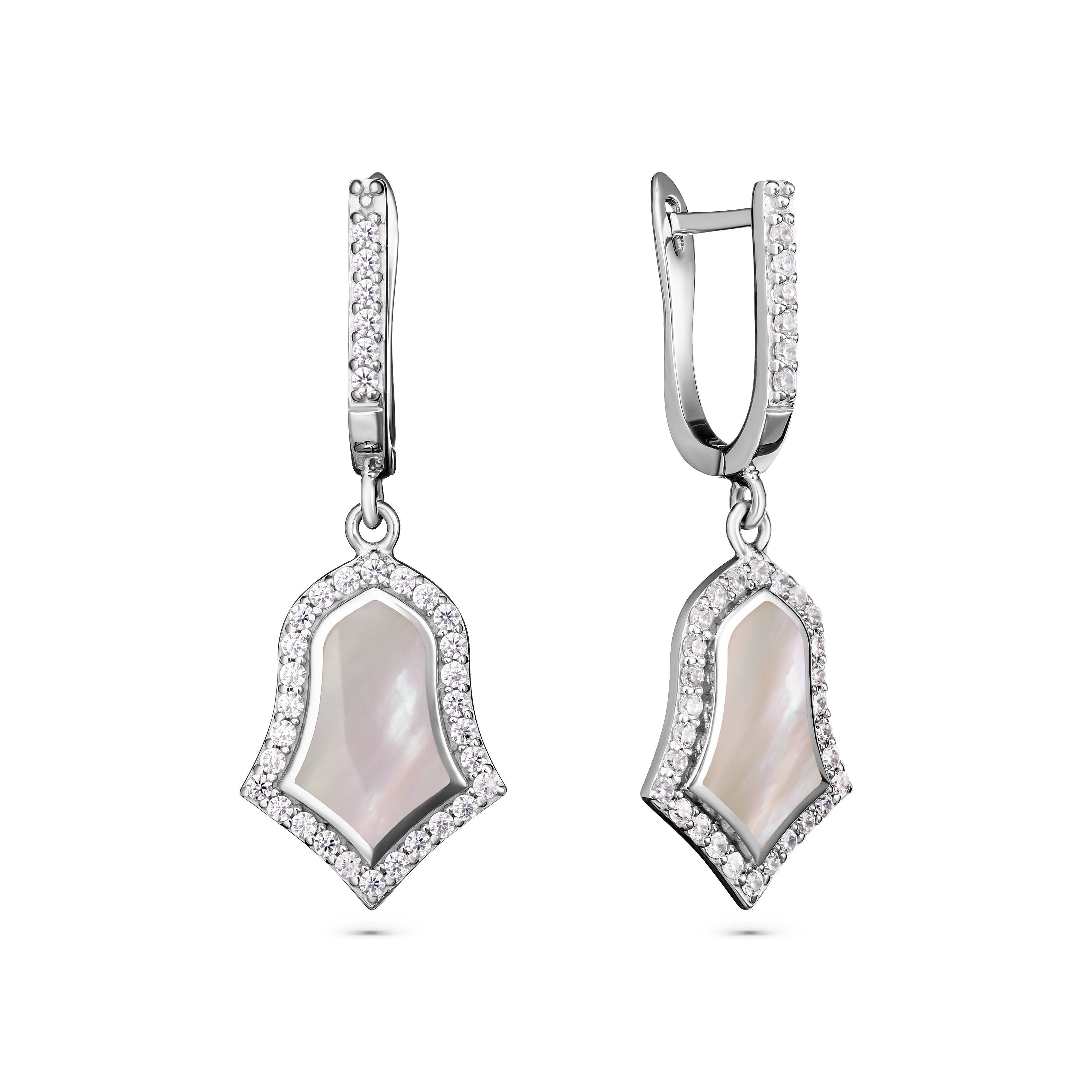 Pair of silver earrings with a central gemstone on a white background