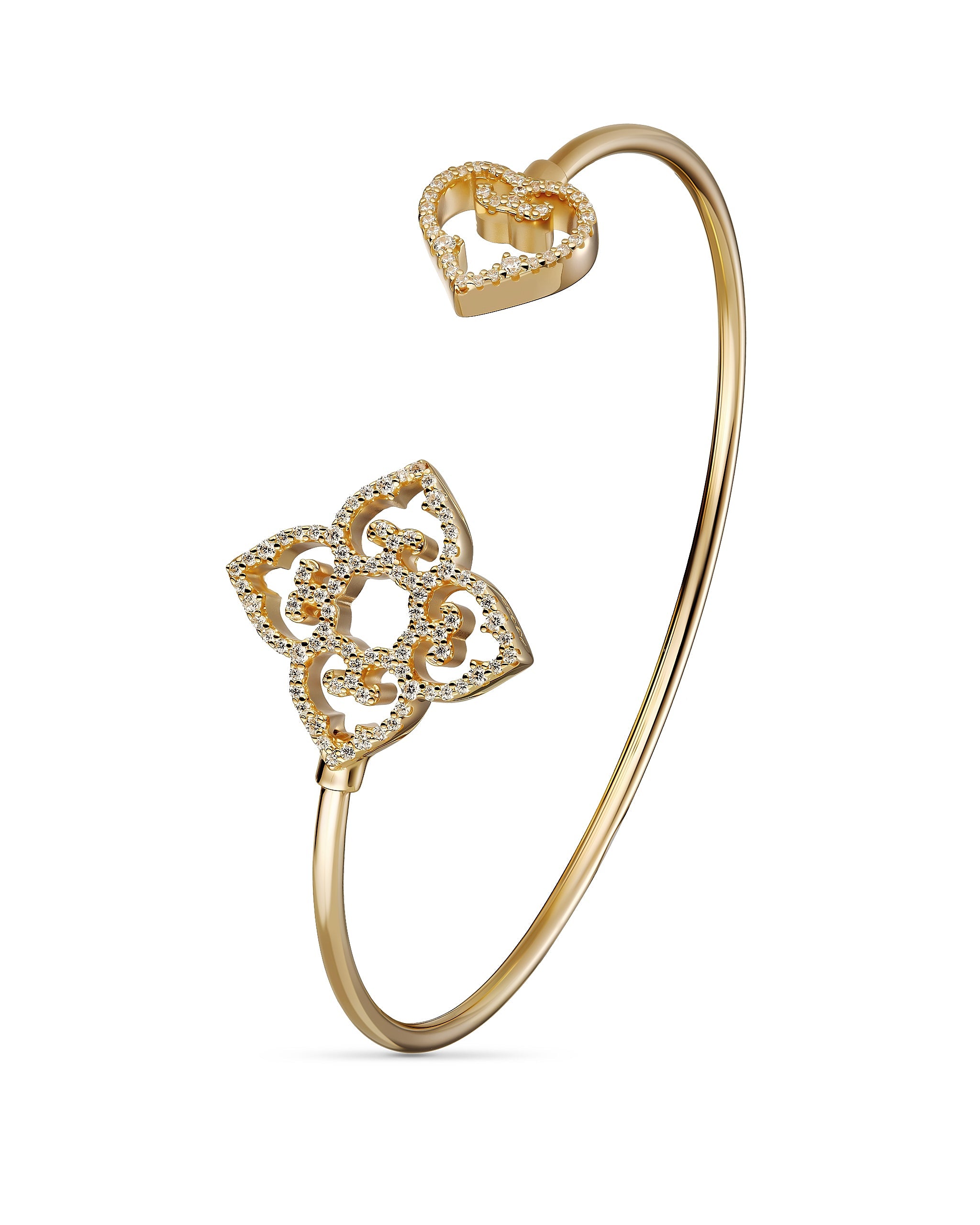 Yellow gold plated sterling silver bangle with zirconia details. Elegant open design with symbolic elements.