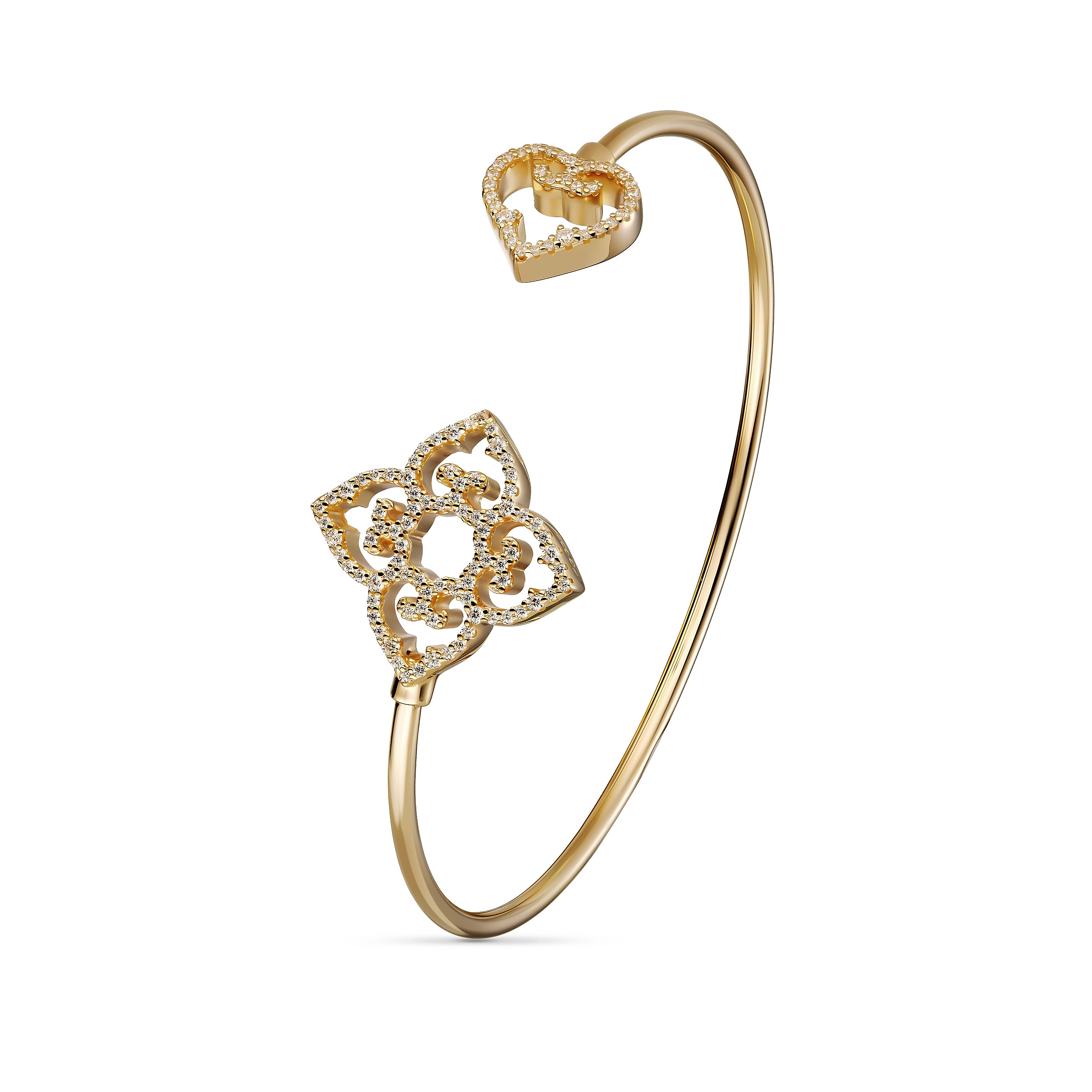 Yellow gold plated sterling silver bangle with zirconia details. Elegant open design with symbolic elements.